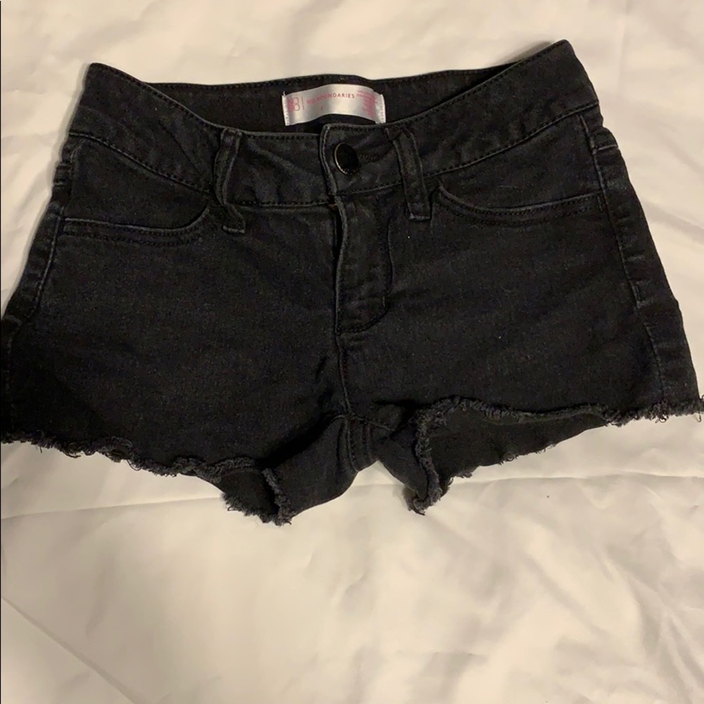 Black distressed shorts